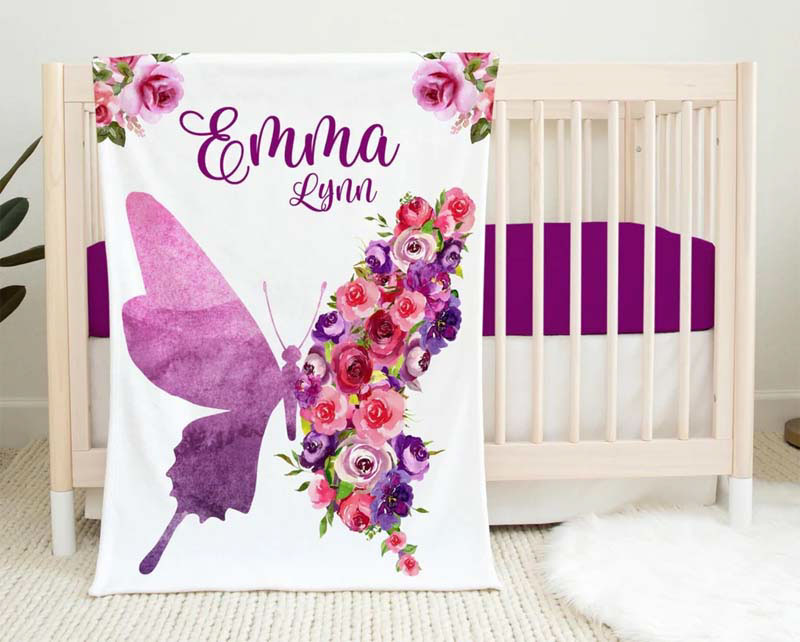  first birthday gifts with floral-theme blanket
